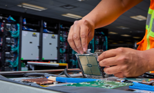 Man handling an MI300A chip